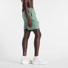 SPORT ESSENTIALS SHORT 7 #DARK JUNIPER NEW BALANCE Shorts MS41232DKJ